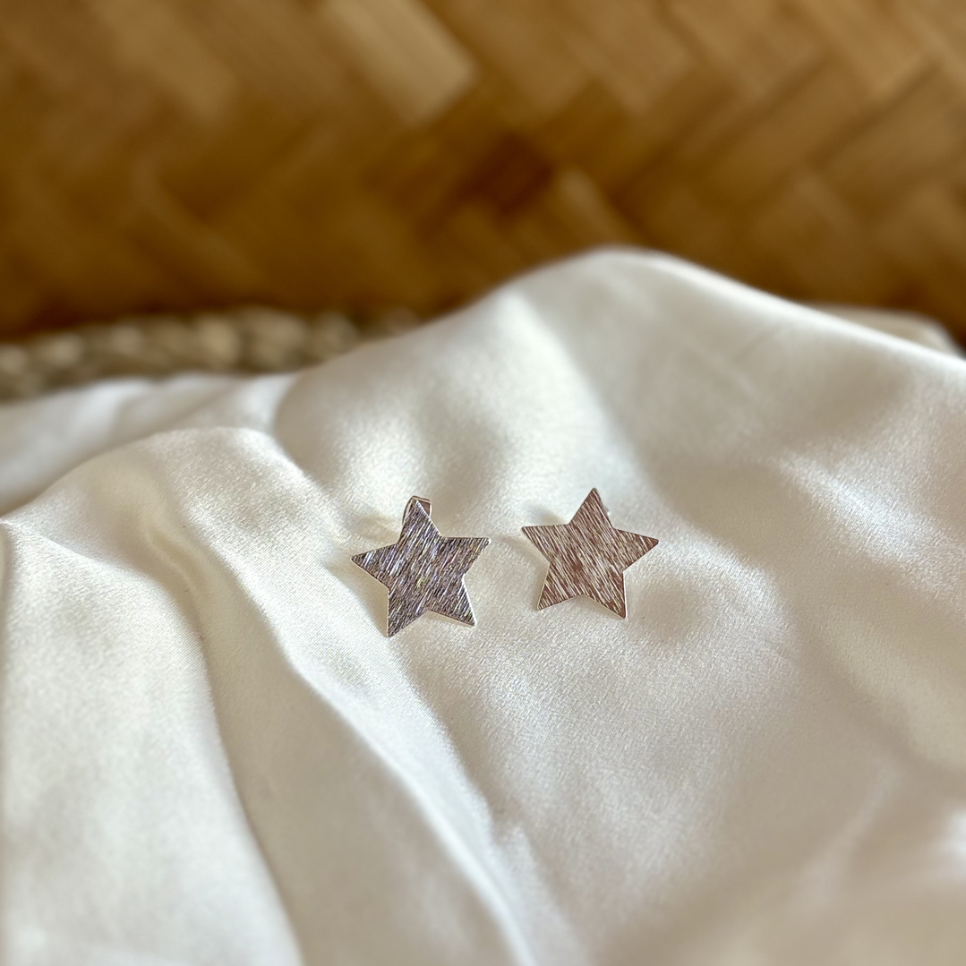 Aro estrella plateada grande 1