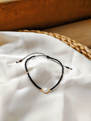 Pulsera negra una perla