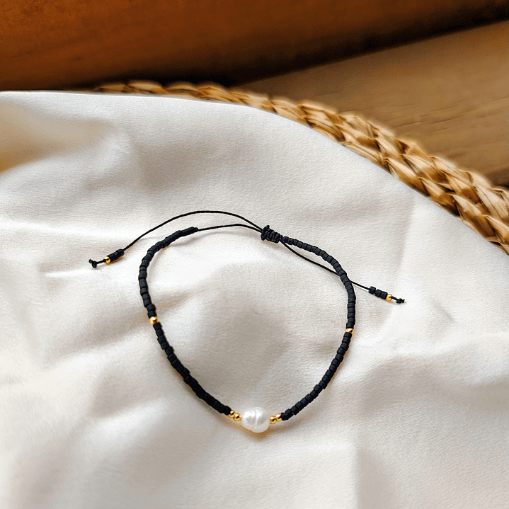 Pulsera negra una perla 1