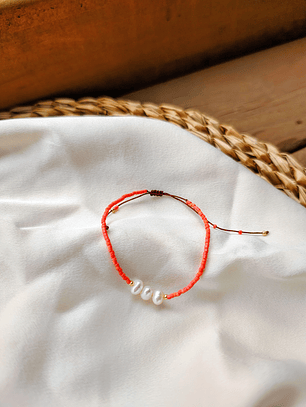 Pulsera naranja tres perlas