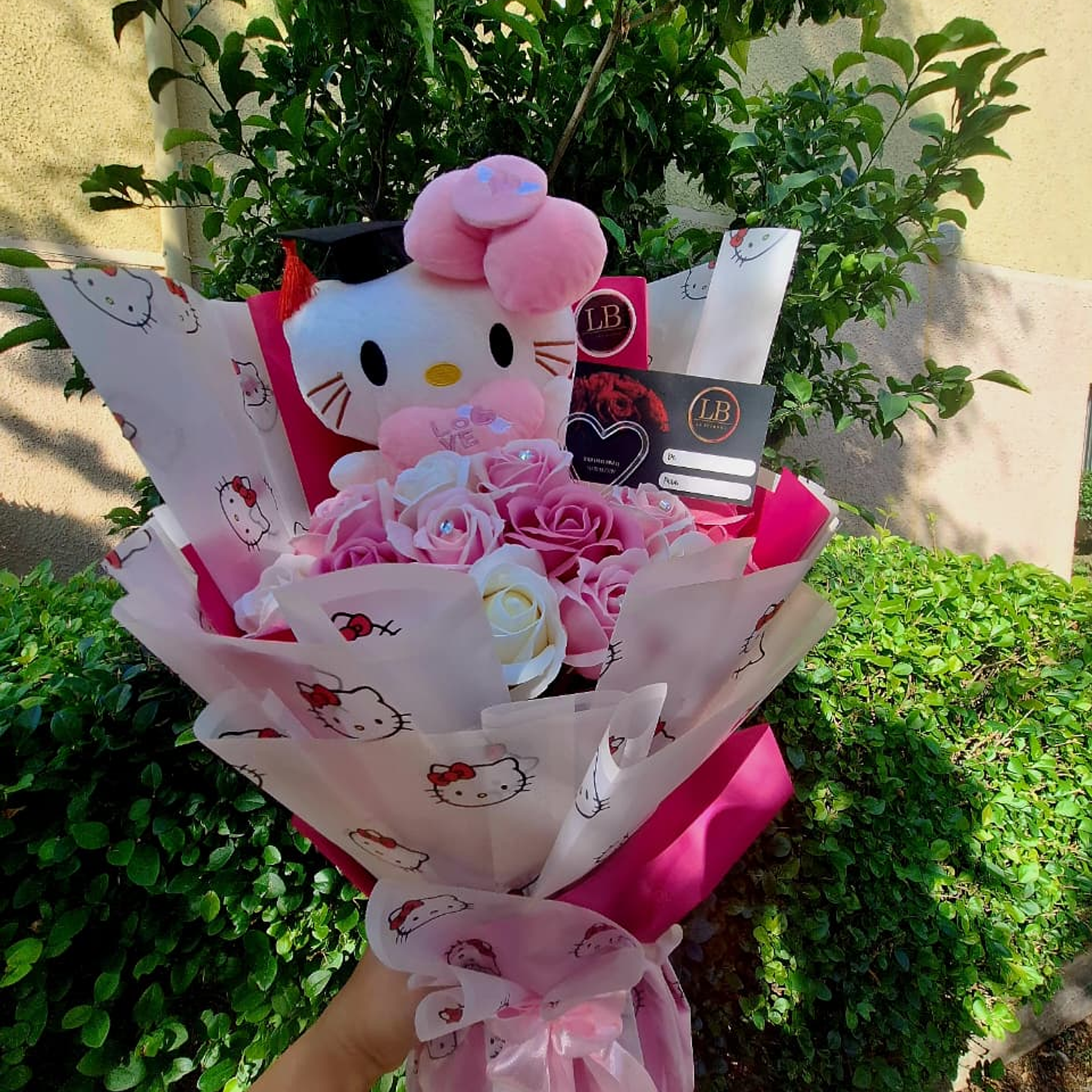 Ramo hello kitty graduada  2