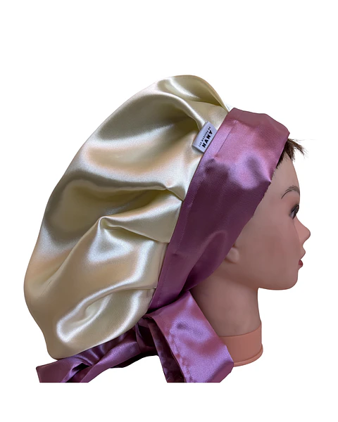 Gorro con lazo L/XL mantequilla/rosa
