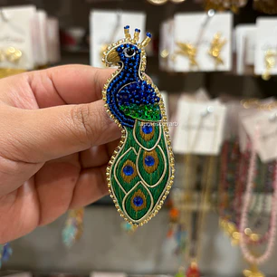 Prendedor Pavo real