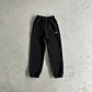 Pants Corteiz negro minimalista - Miniatura 1