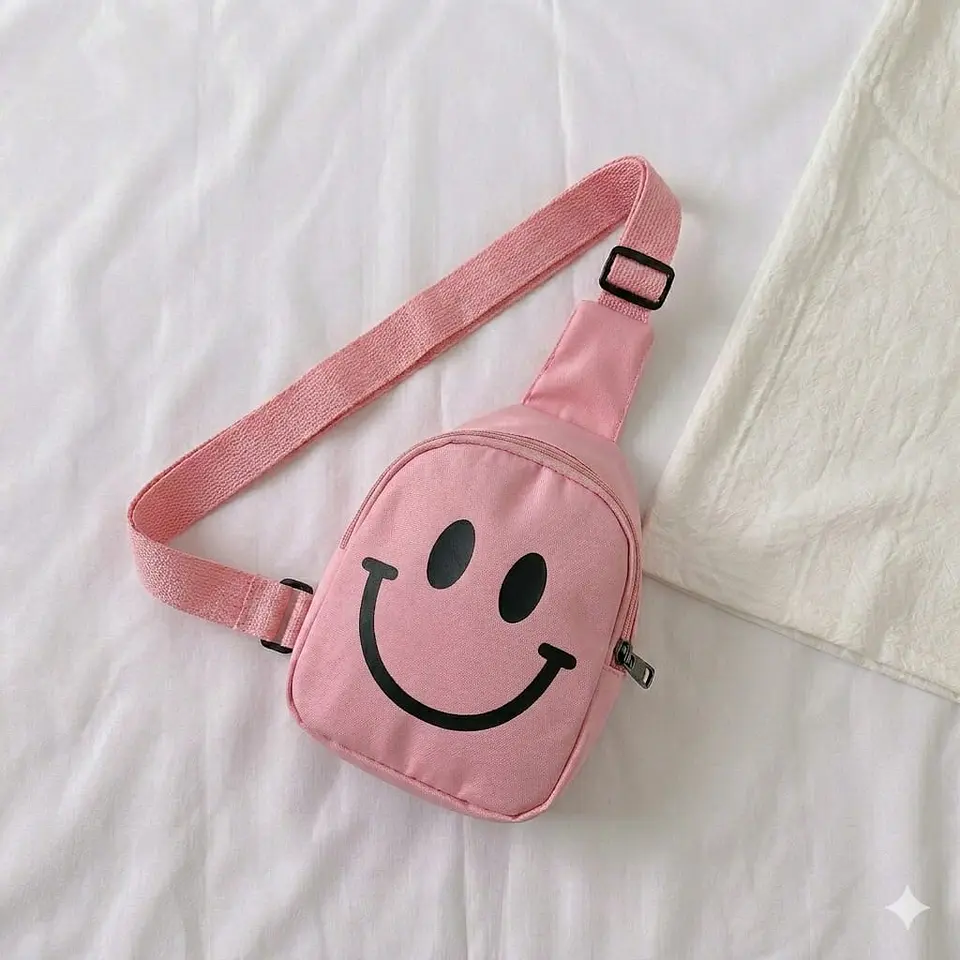 Mini Mochila Bandolera Infantil Rosa con Carita Feliz 1