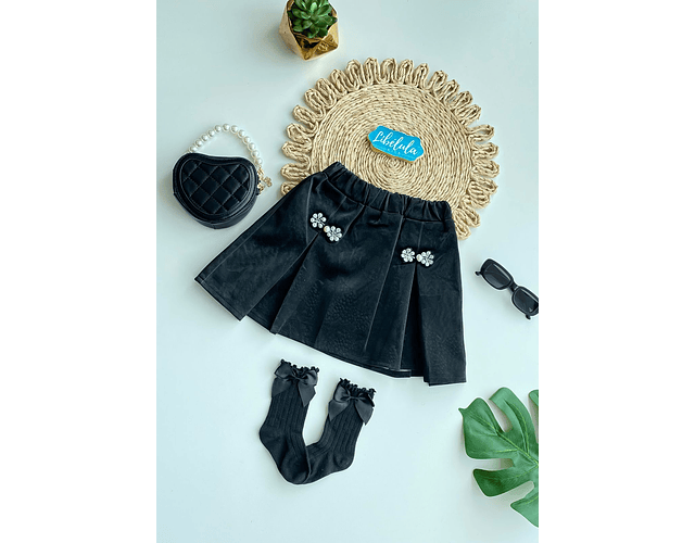 Falda plisada cotele brillos 