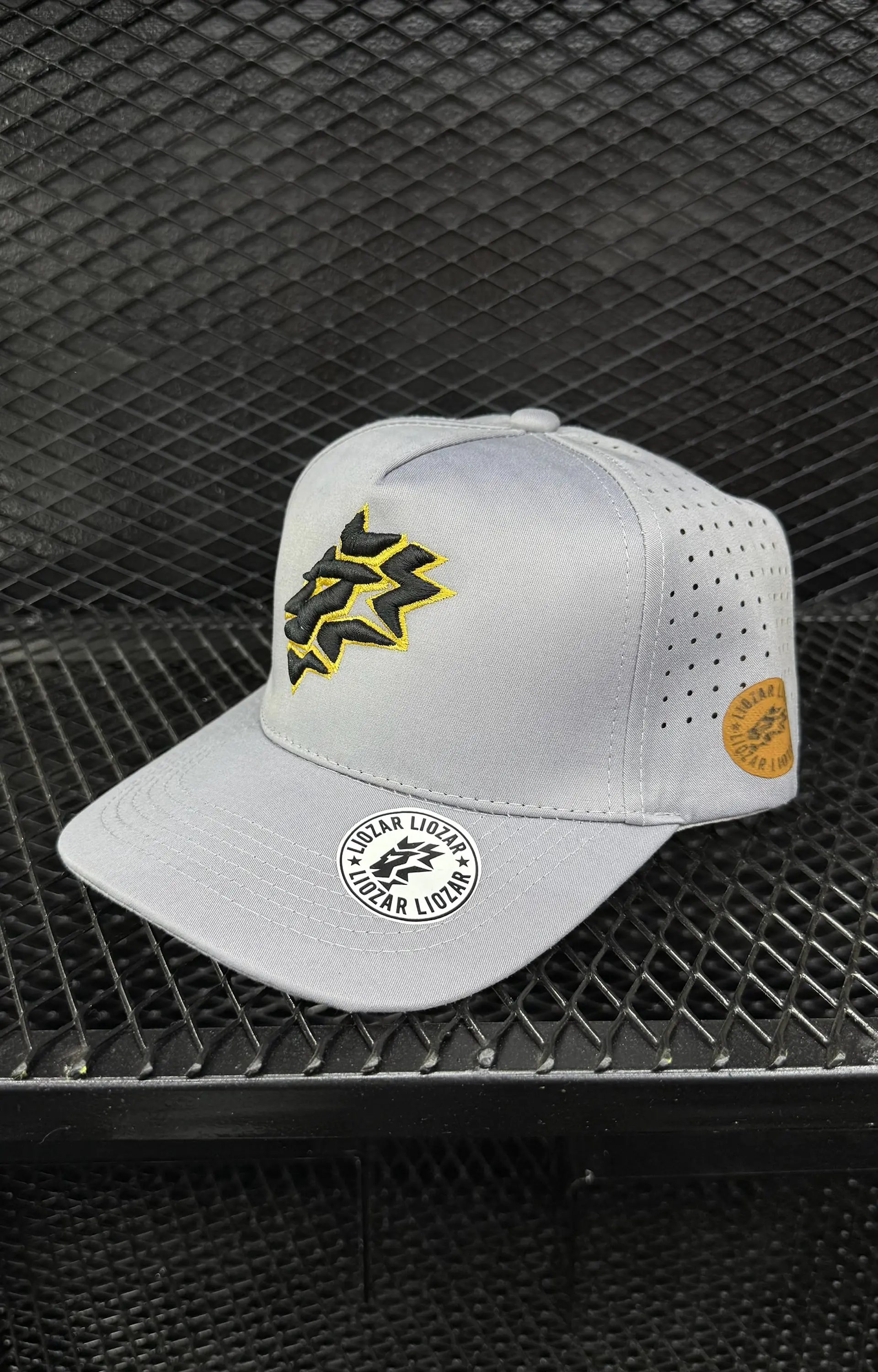 GORRAS DE ALGODON PERFORADA UNISEX-LEON 5