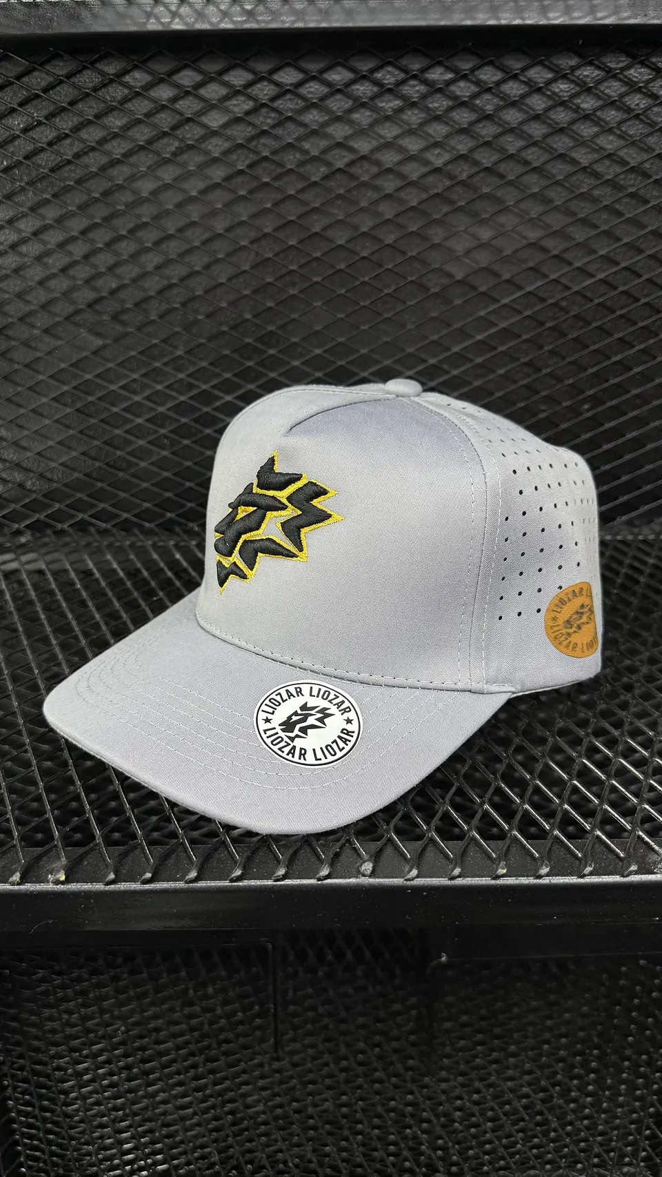 GORRAS DE ALGODON PERFORADA UNISEX-LEON 5