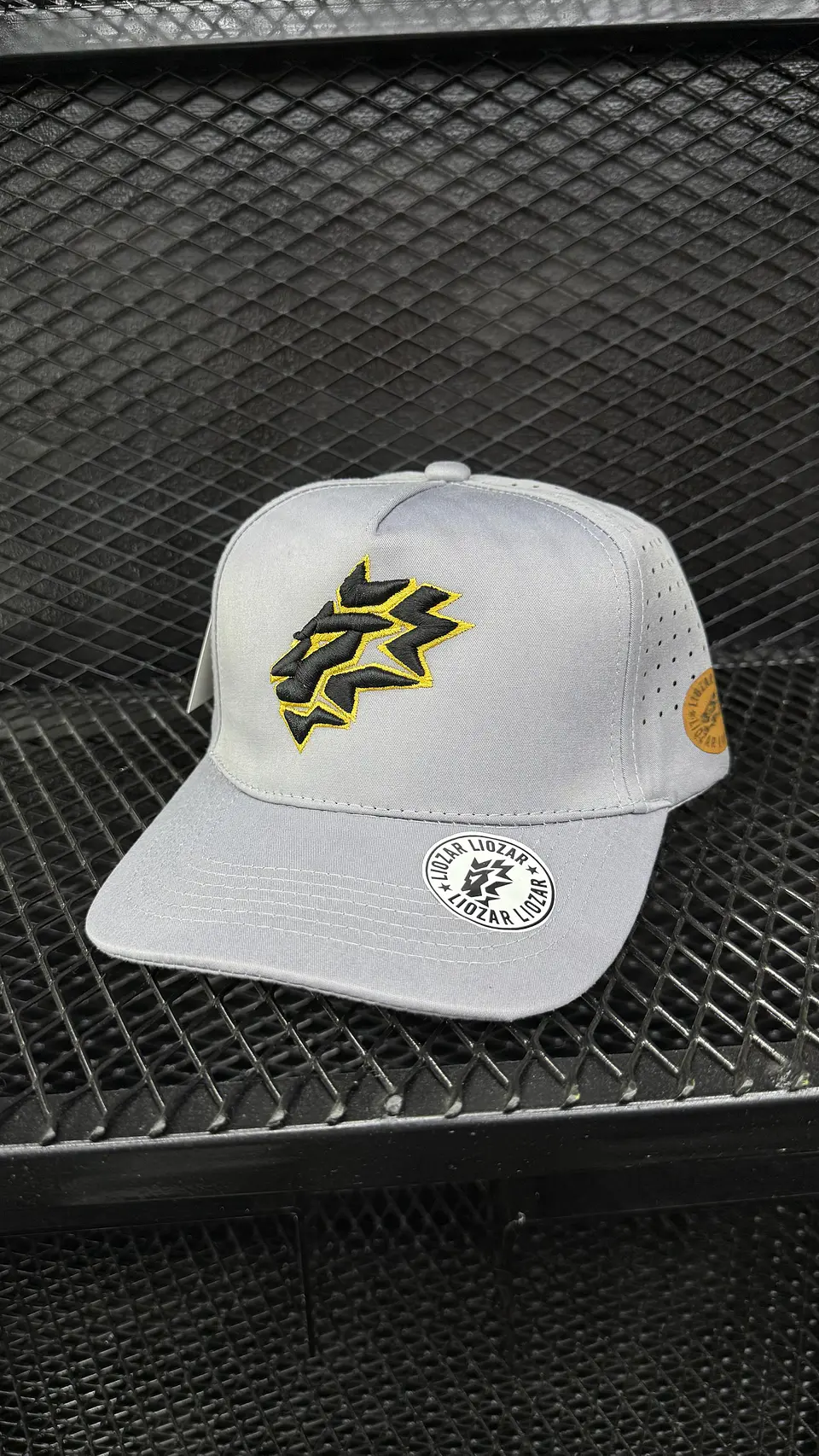 GORRAS DE ALGODON PERFORADA UNISEX-LEON 7