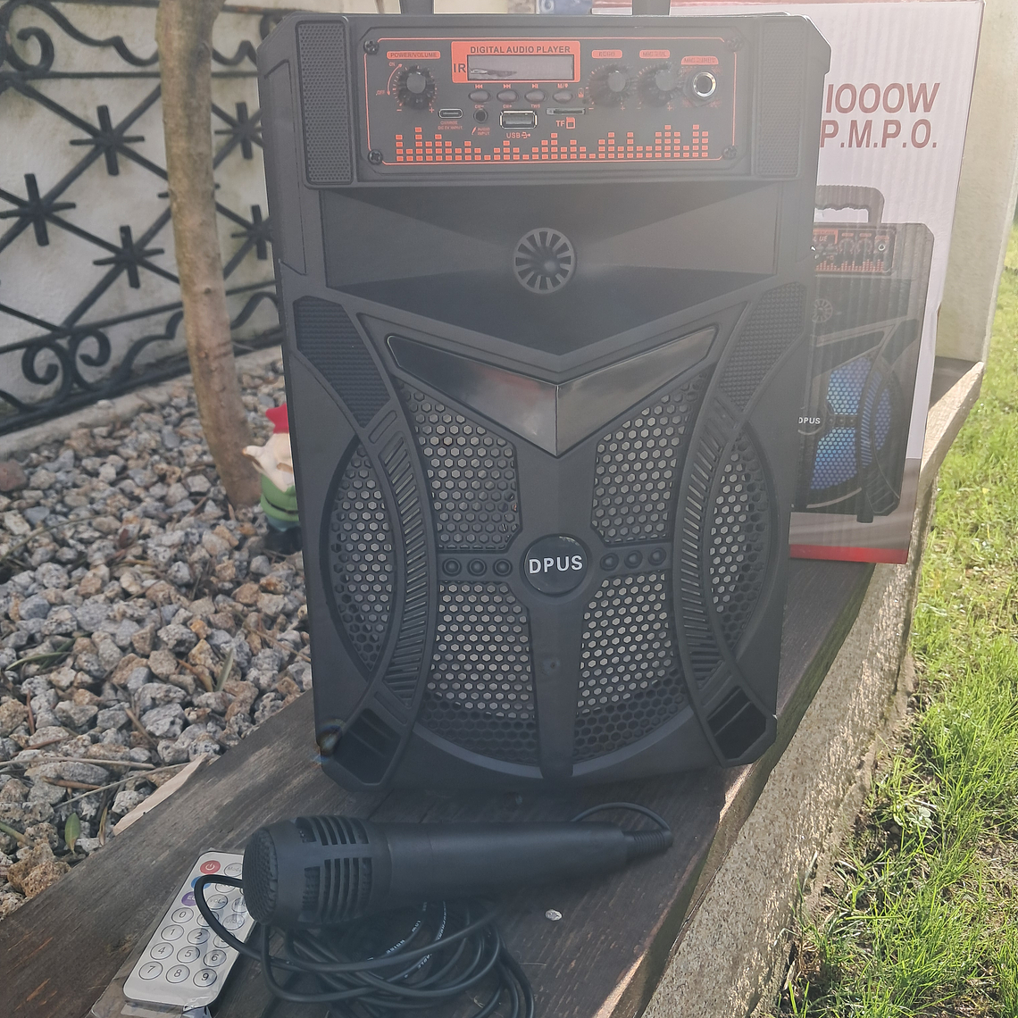 Coluna para karaoke com microfone e comando  1