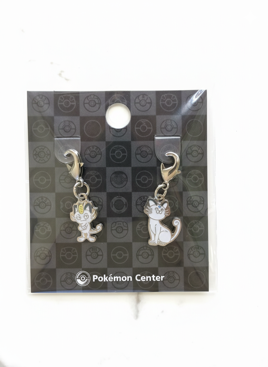 Set de Charms Metálicos: Meowth & Persian de Alola – Pokémon Center Original 1