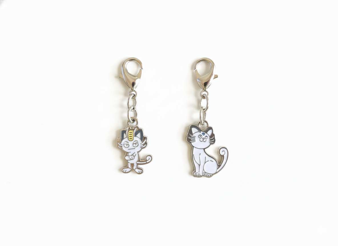 Set de Charms Metálicos: Meowth & Persian de Alola – Pokémon Center Original 2