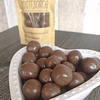 Coco Bañado en Chocolate de Leche
