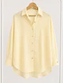 Camisa oversized rayitas mantequilla 