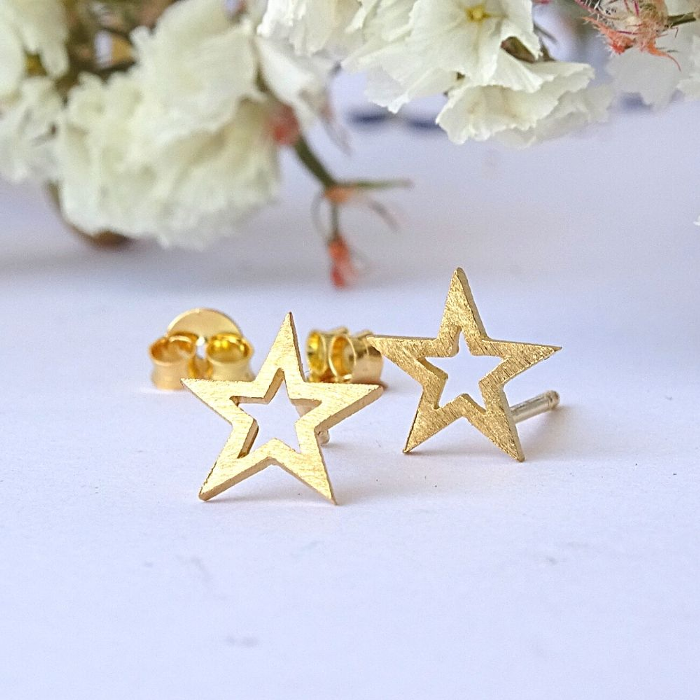 Aritos De Plata con baño de Oro Estrellas Abiertas 2