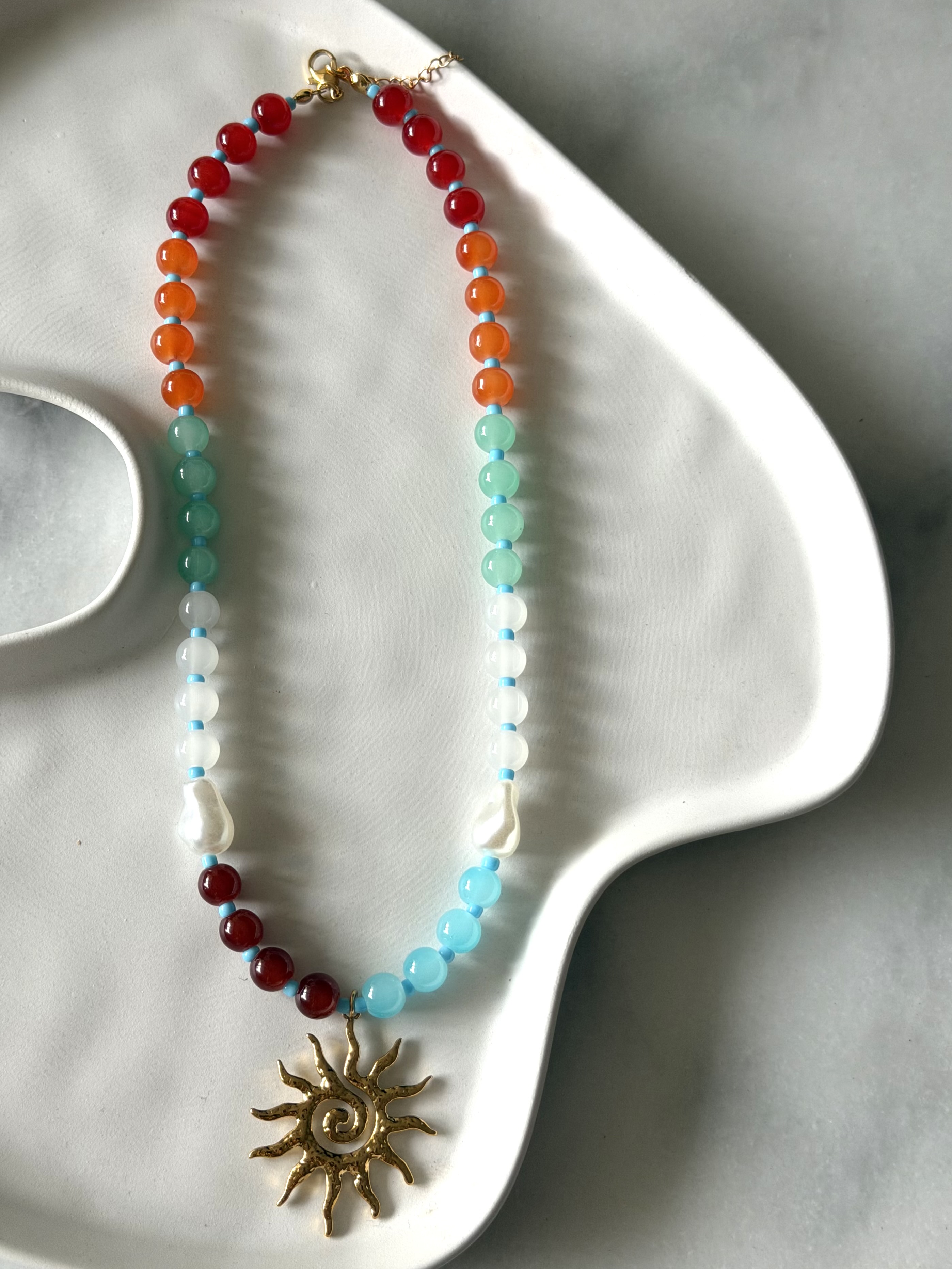 COLLAR SOL AZTECA RUBI
