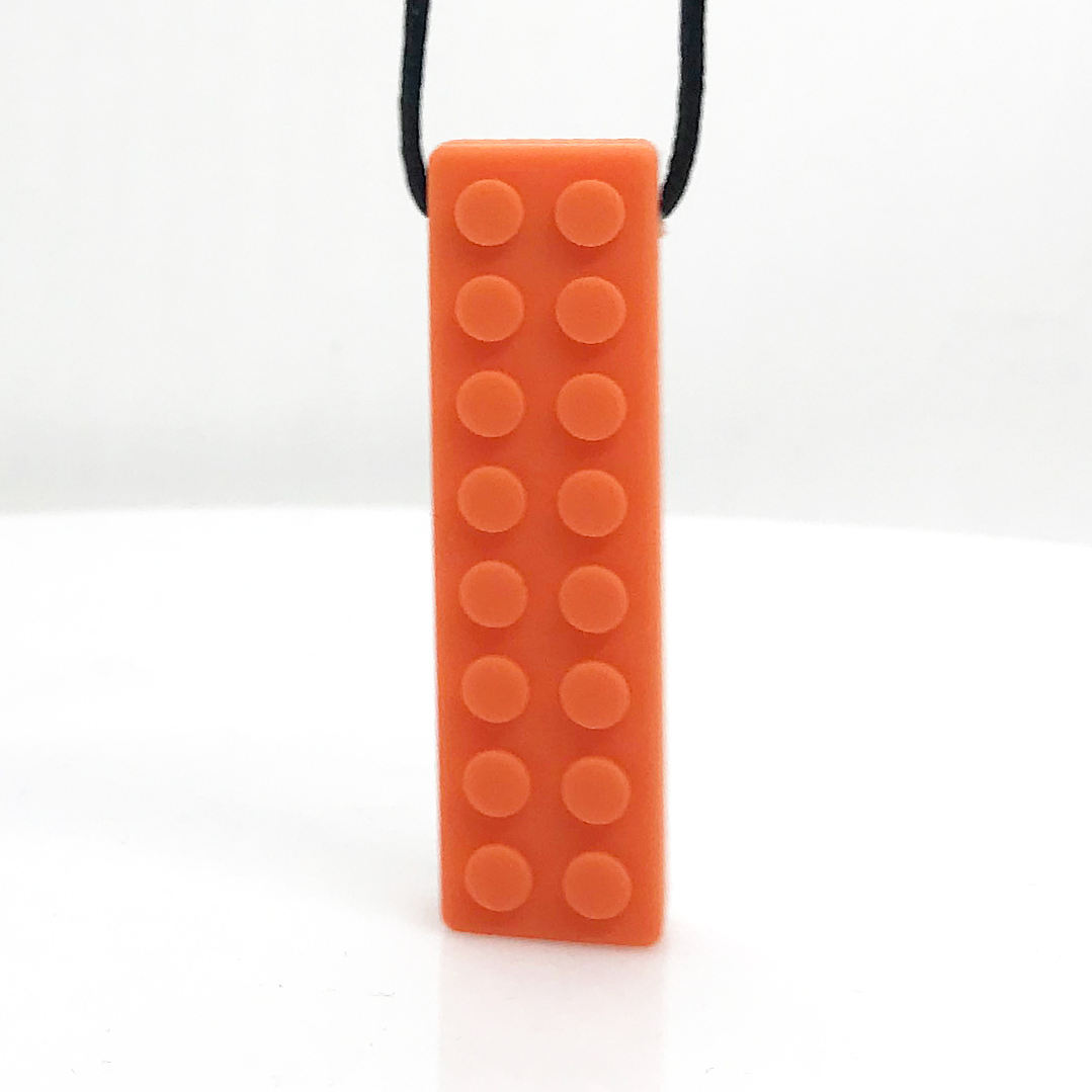 Mordedor Colgante Lego 4