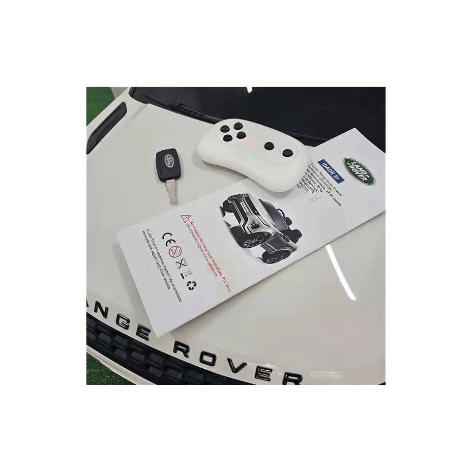 RANGE ROVER EVOQUE 12v Branco c/ RODAS DE BORRACHA E ASSENTO EM PELE 11
