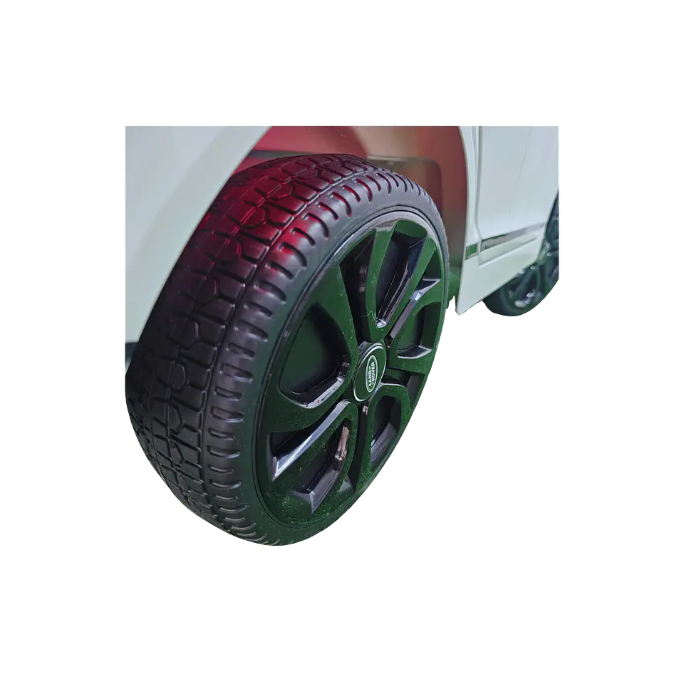 RANGE ROVER EVOQUE 12v Branco c/ RODAS DE BORRACHA E ASSENTO EM PELE 5