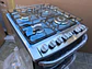 Cocina Electrolux doble horno 56dxa Producto nuevo sin uso con detalle en lata del costado - Miniatura 2