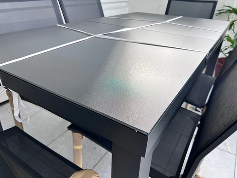 Comedor terraza exterior aluminio EXTENSIBLE 4 sillas 2 sitiales Mesa cubierta vidrio templado 