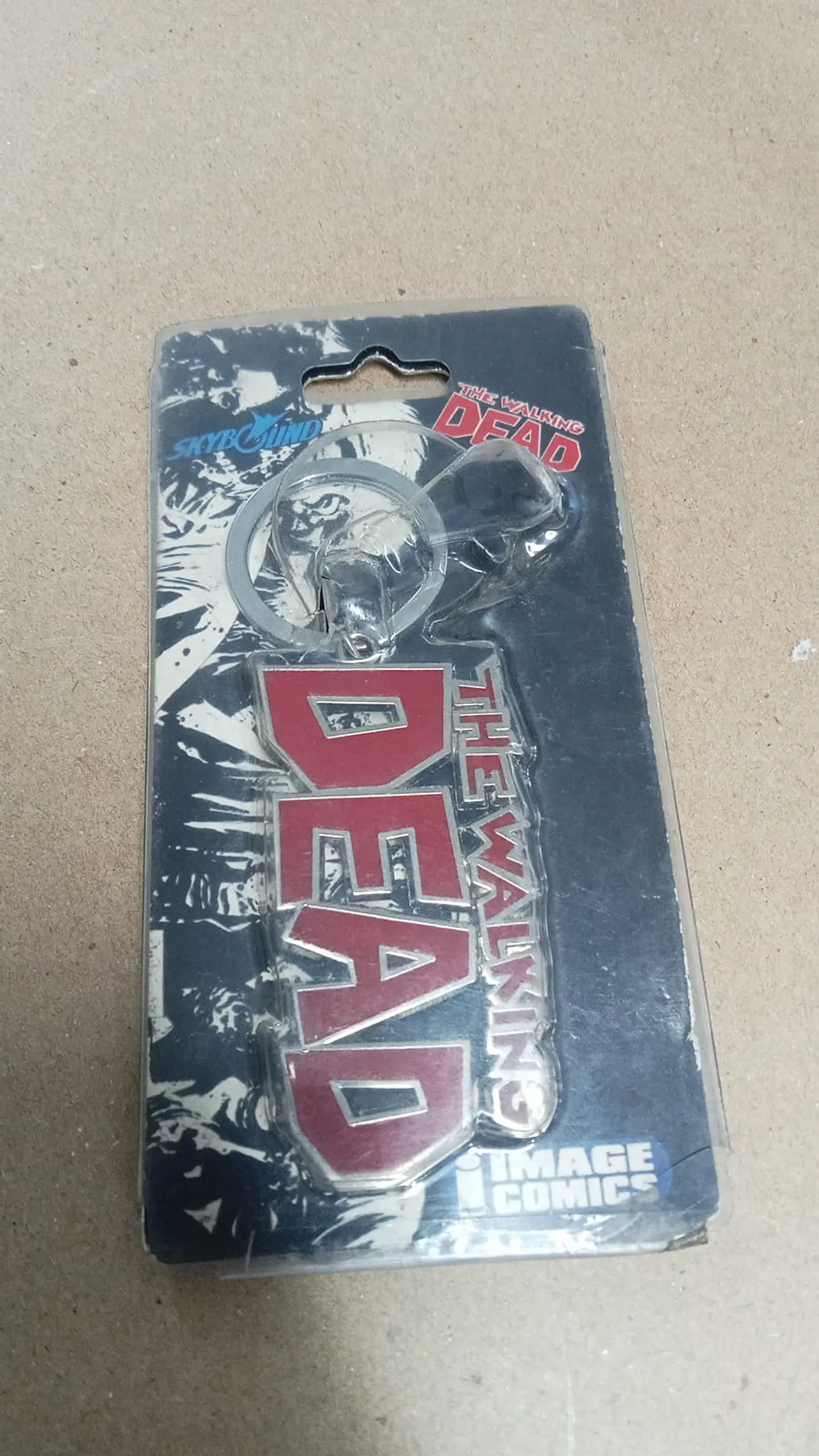 the walking dead - llavero en acero  1