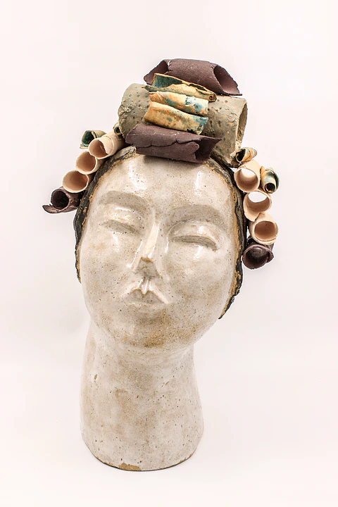 Cabezas Manos de Gres