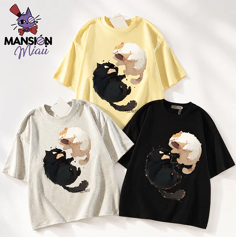 POLERA GATOS PELEANDO 