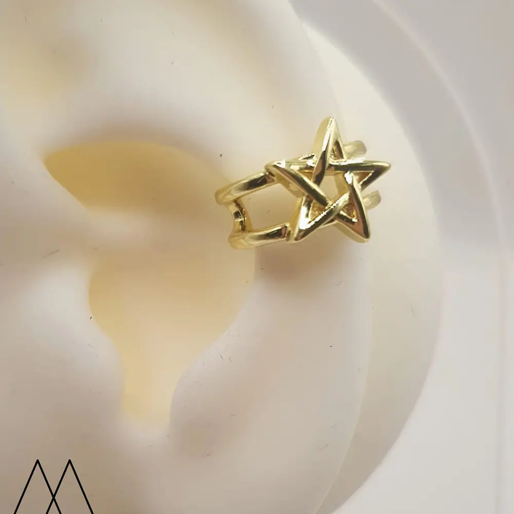 Earcuff estrella dorada