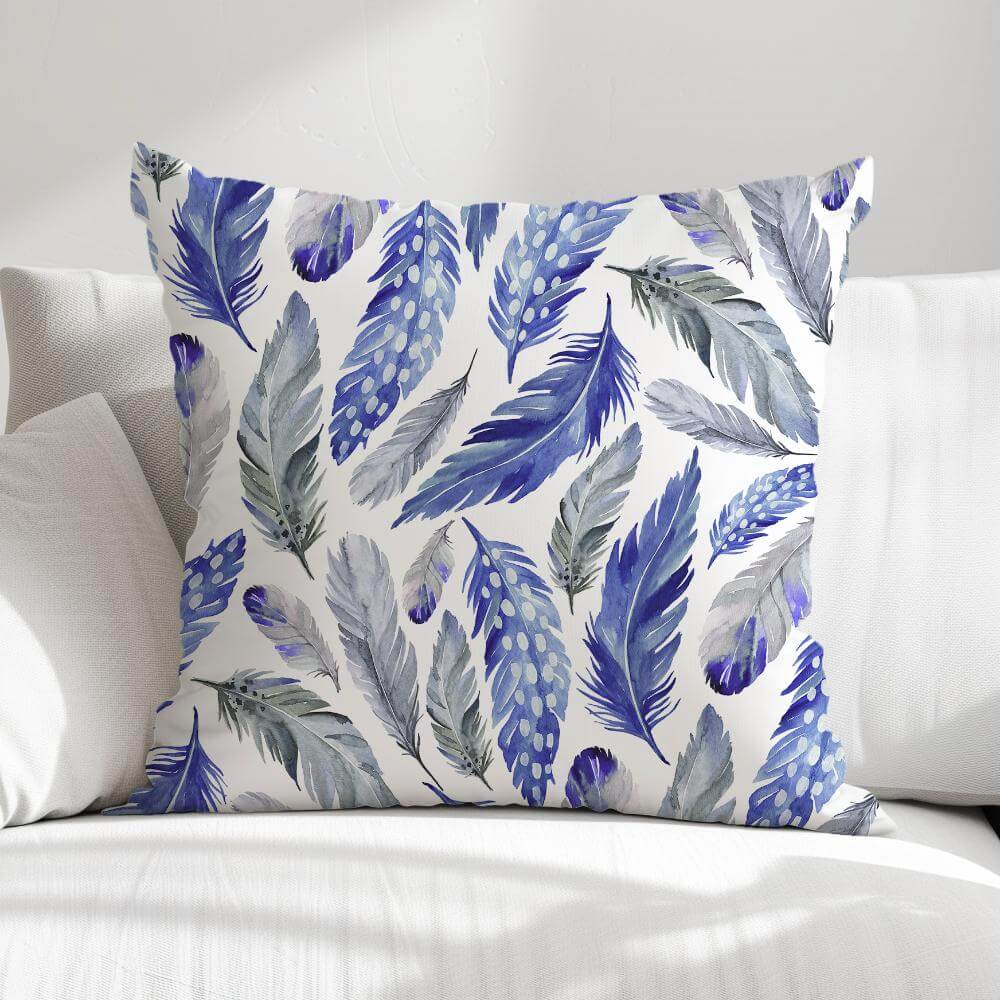 FUNDA DE COJIN PLUMAS AZULES 1