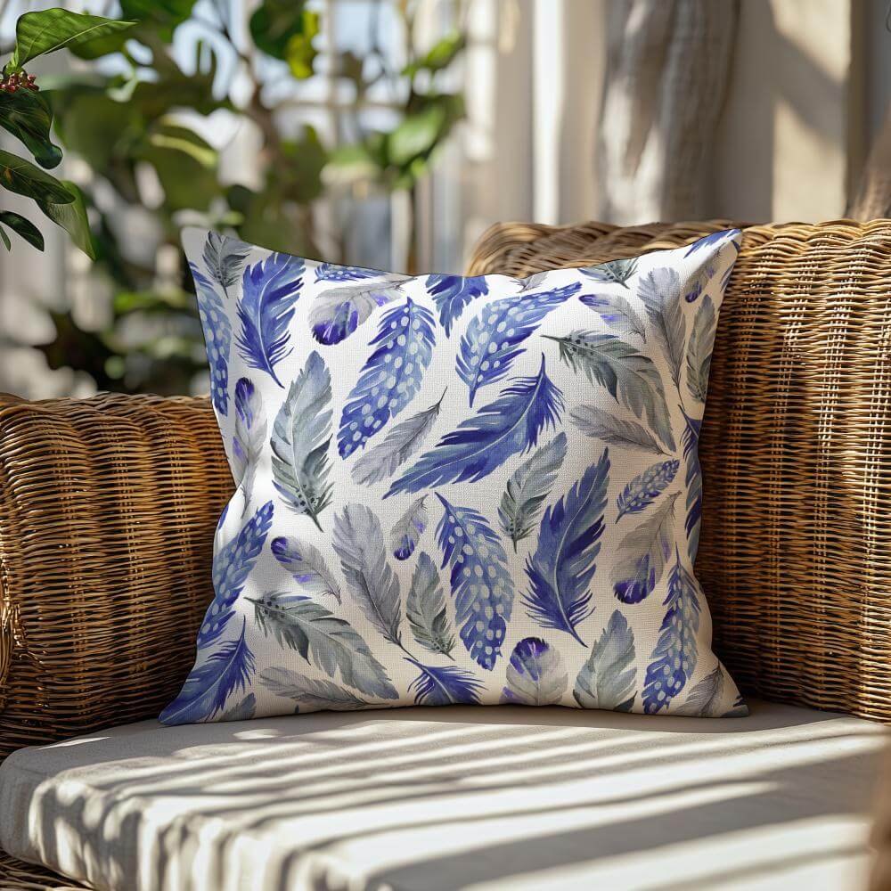 FUNDA DE COJIN PLUMAS AZULES 2