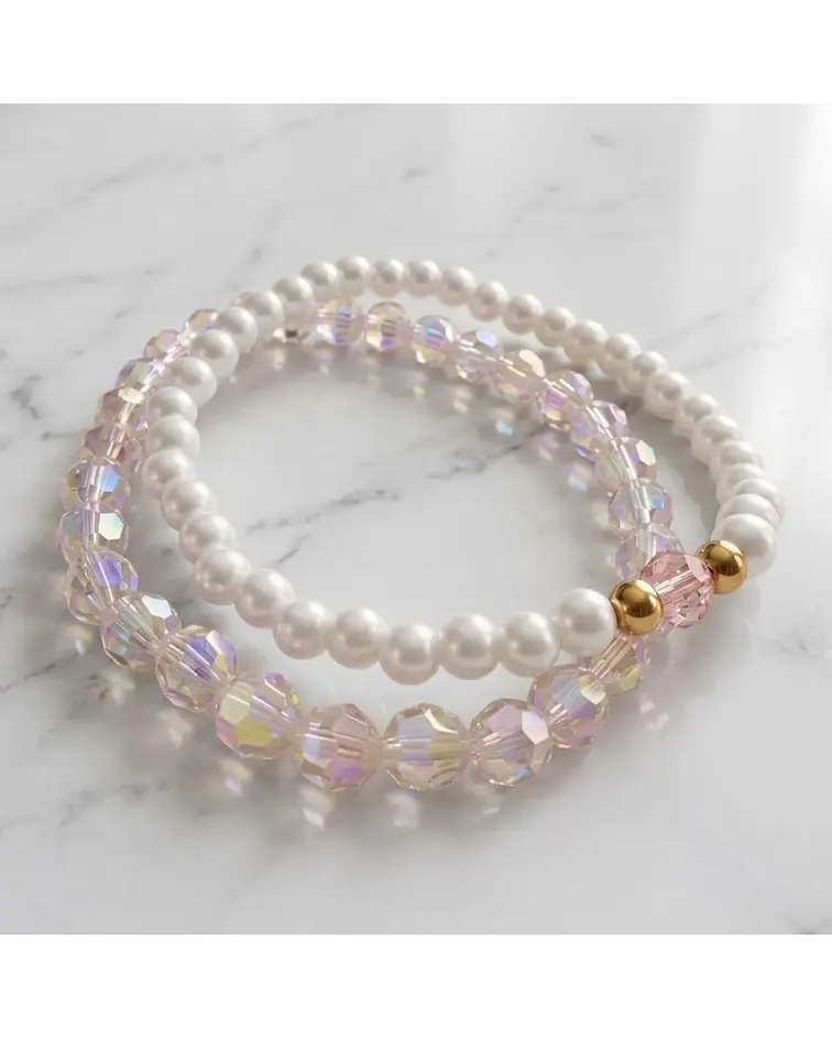 Conjunto de pulseras tornasol rosada y perla cod.00021