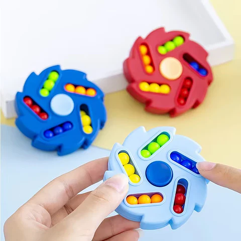 FIDGET MULTITAREA 5 PATAS CON PELOTAS