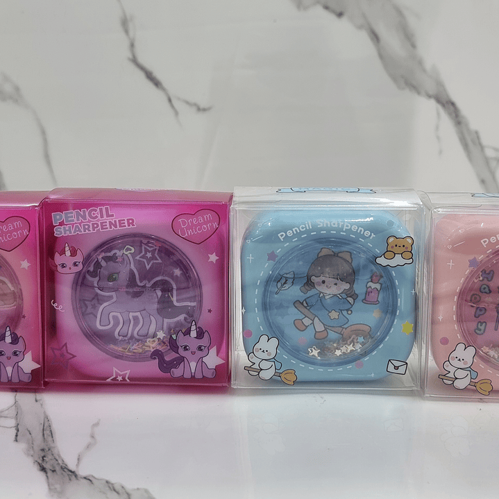 SACAPUNTAS CON ARENA 4