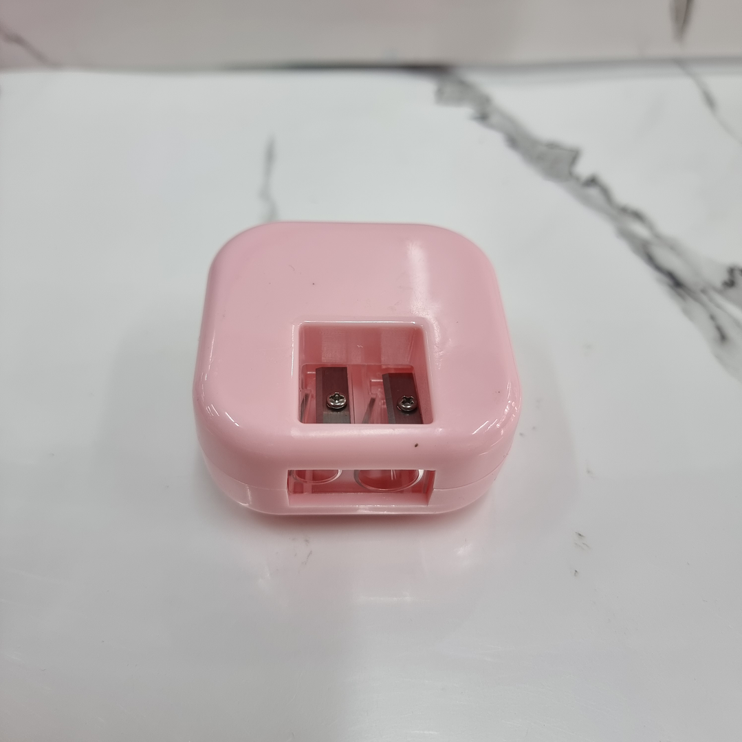 SACAPUNTAS CON ARENA 3