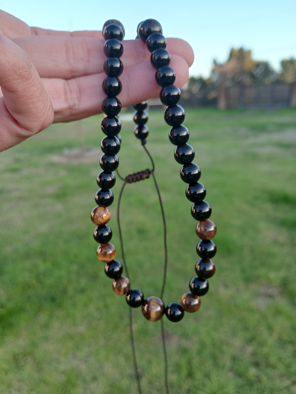 Collar de hilo regulable de piedras ónix y ojo de tigre 4