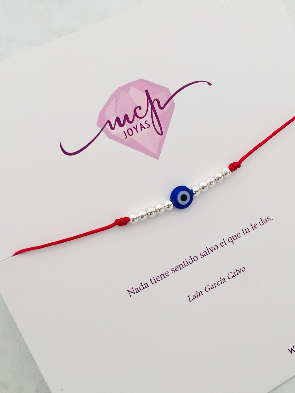 Pulsera ojo turco regulable con bolitas de plata 1