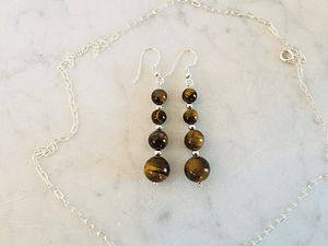 Aros de piedras ojo de tigre y detalles de plata