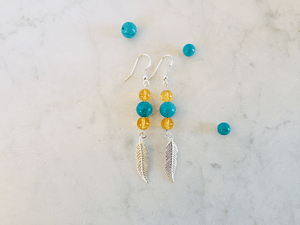 Aros pluma de plata con piedras citrino y turquesa