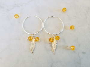 Argollas plumas de plata con piedras citrino
