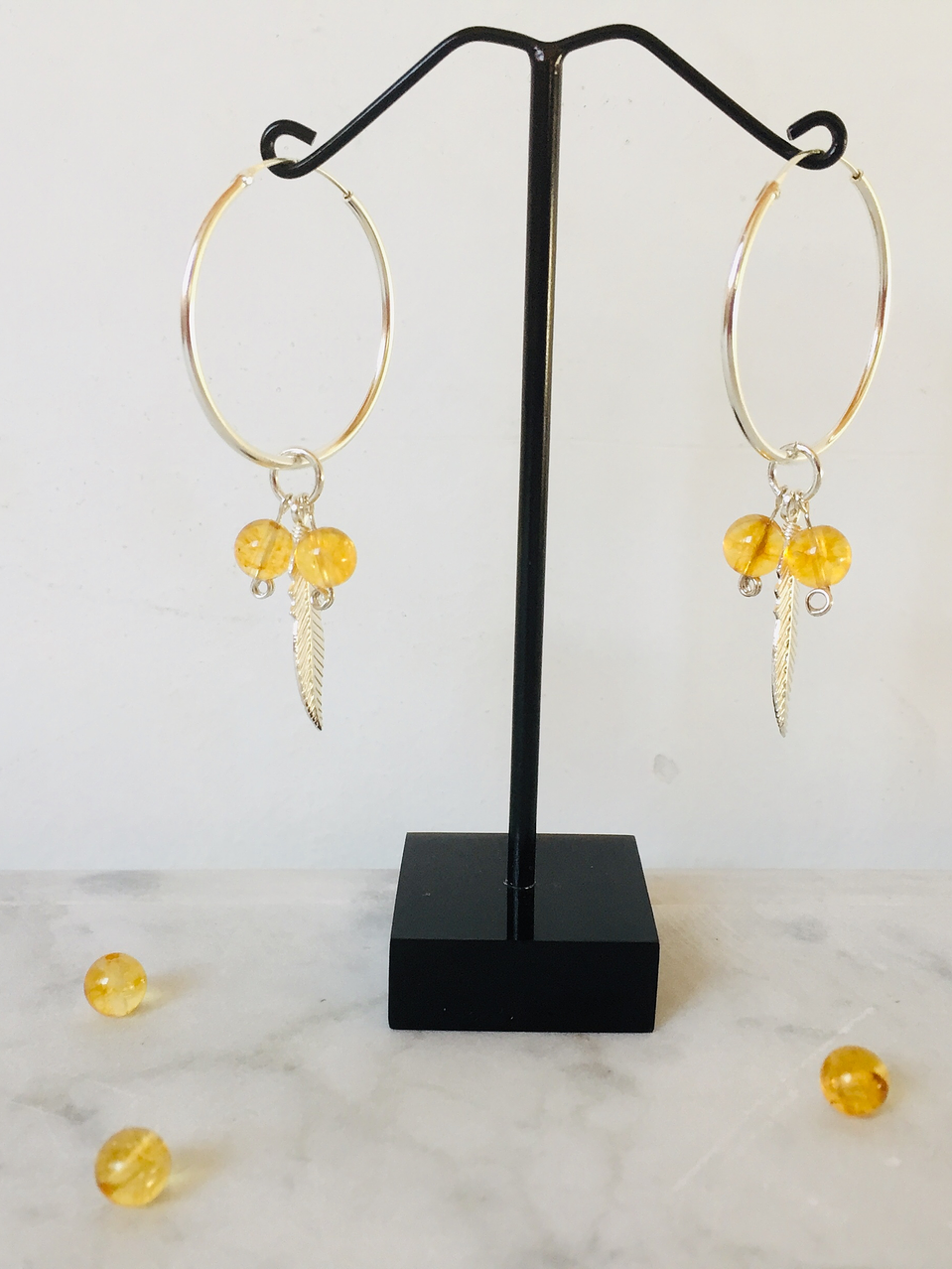 Argollas plumas de plata con piedras citrino 3