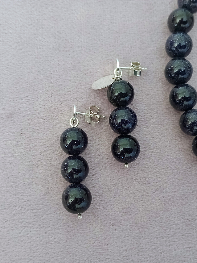 Aros de piedras lluvia de estrellas y base de plata 1