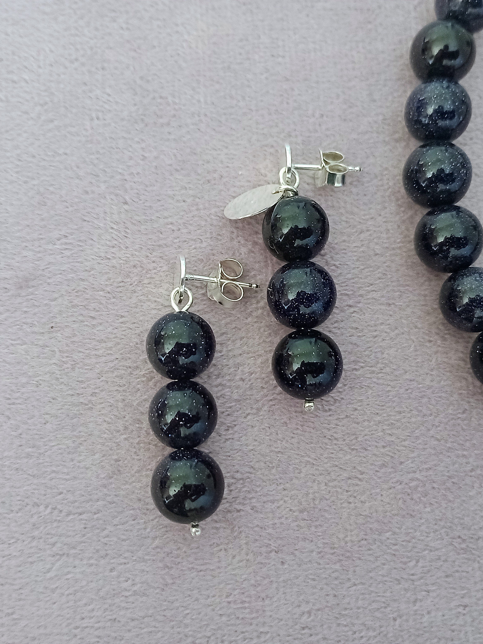 Aros de piedras lluvia de estrellas y base de plata 1