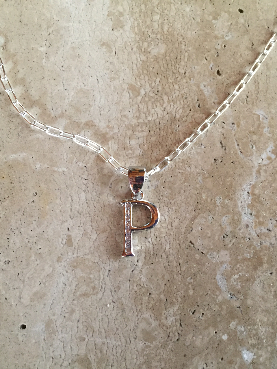 Cadena e inicial de plata 1