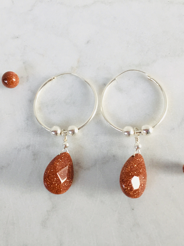 Argollas de plata y gota de piedra del sol facetada 1