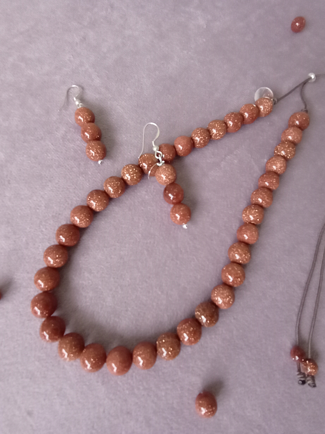 Conjunto de collar de hilo regulable y aros de piedra del sol 1