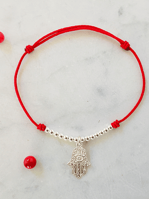 Pulsera de hilo regulable con mano de Fátima y detalles de plata 