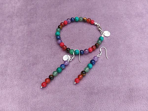 Conjunto de pulsera y aros de piedras de los 7 chakras