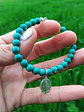 Pulsera de piedras turquesa y Virgencita de los rayos - Miniatura 3