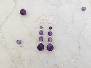 Aros de piedras amatista y detalles de plata